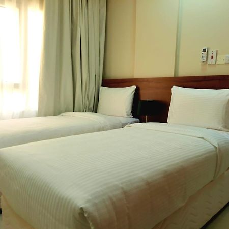 Grand Orchid Hotel Apartment Дукм Екстериор снимка