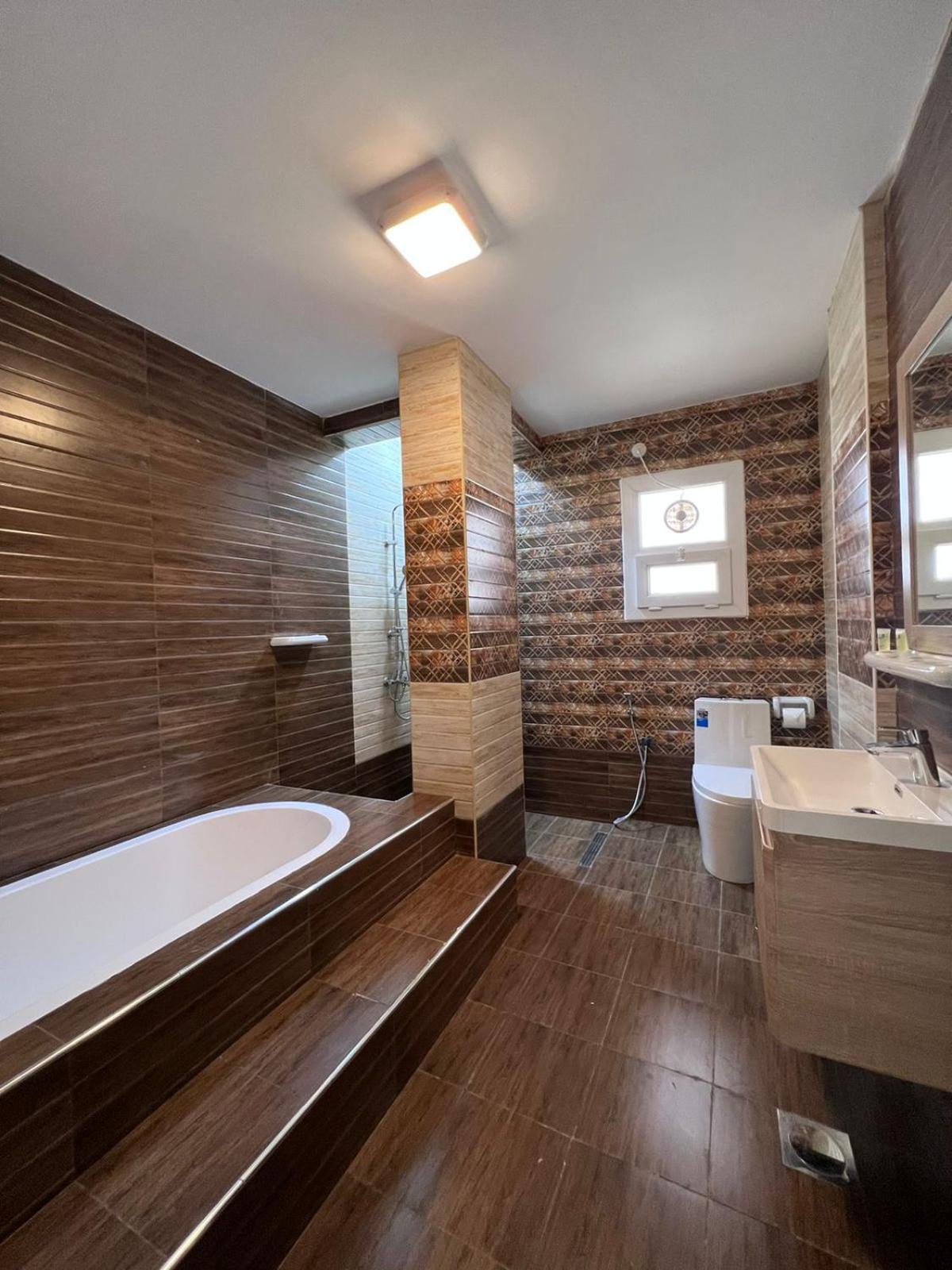 Grand Orchid Hotel Apartment Дукм Екстериор снимка