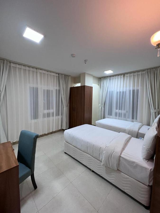Grand Orchid Hotel Apartment Дукм Екстериор снимка