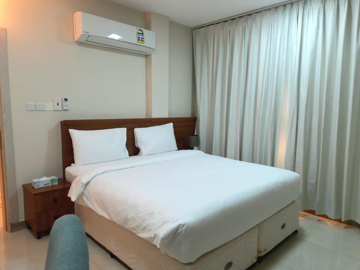 Grand Orchid Hotel Apartment Дукм Екстериор снимка