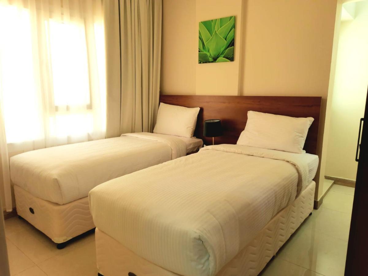 Grand Orchid Hotel Apartment Дукм Екстериор снимка