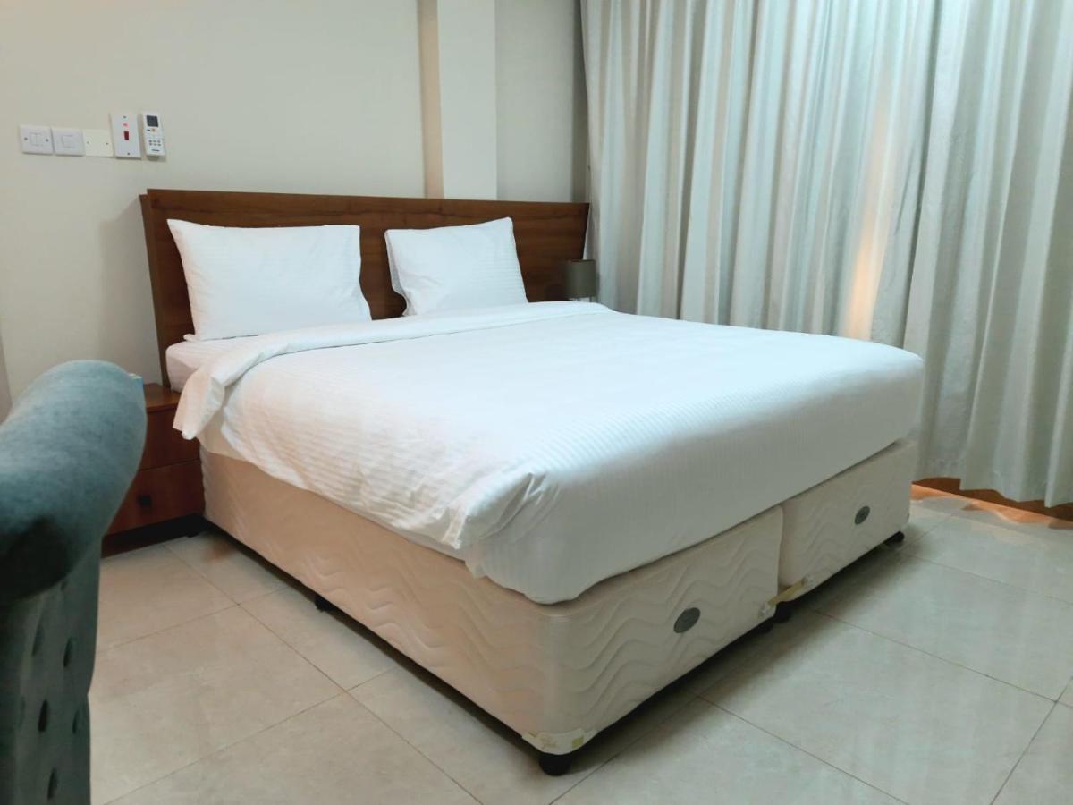 Grand Orchid Hotel Apartment Дукм Екстериор снимка