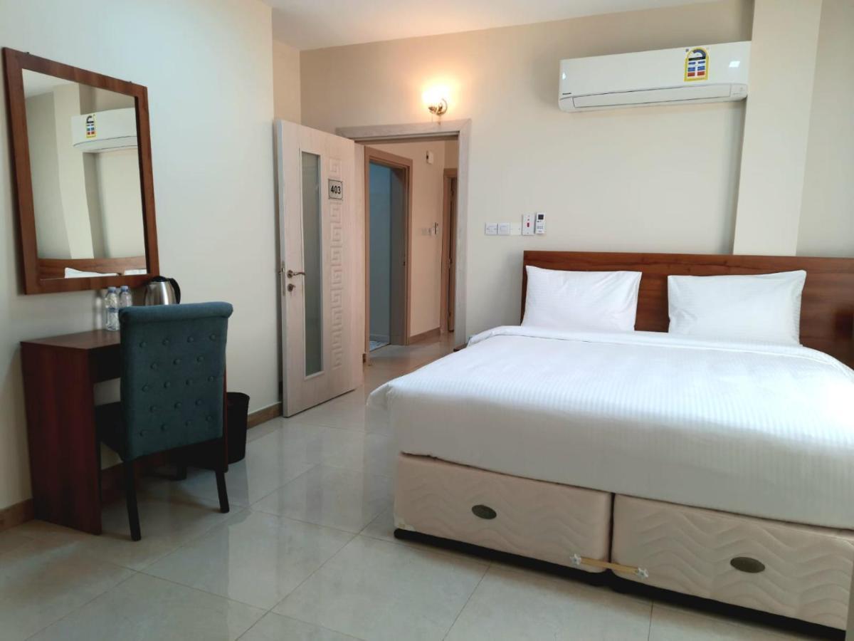 Grand Orchid Hotel Apartment Дукм Екстериор снимка