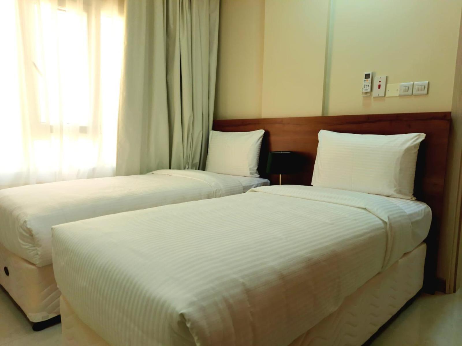 Grand Orchid Hotel Apartment Дукм Екстериор снимка