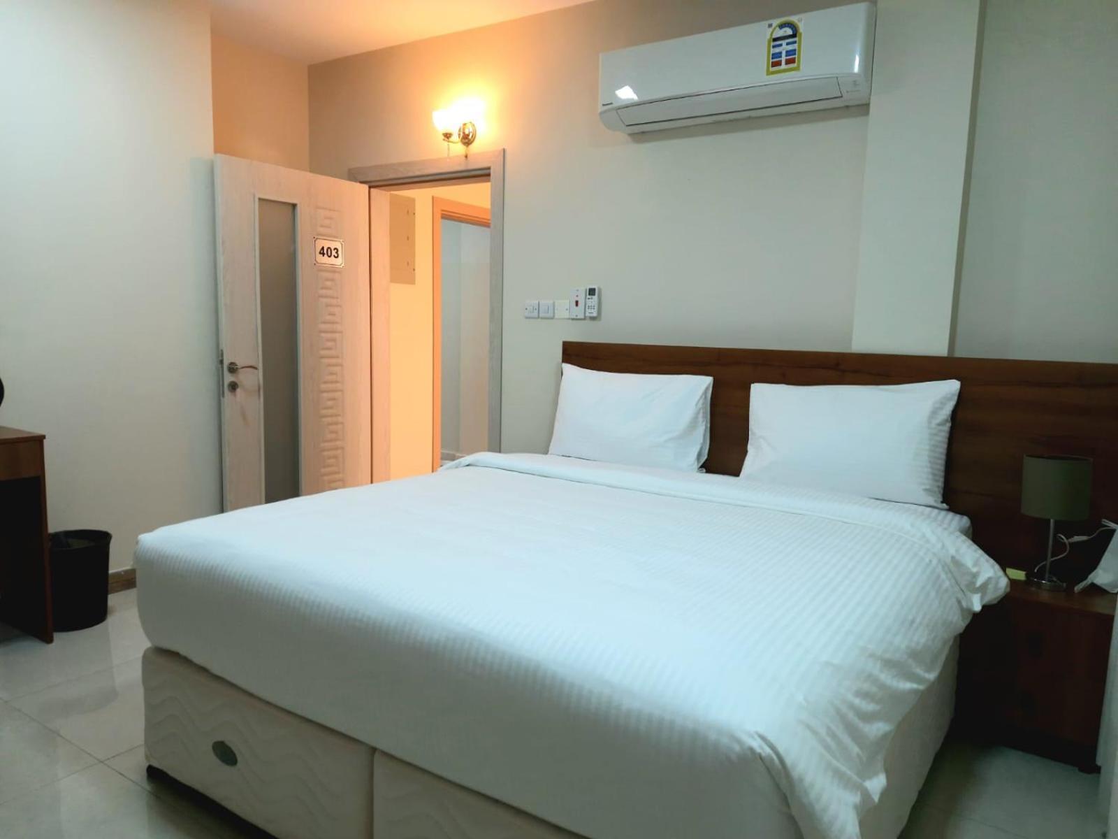 Grand Orchid Hotel Apartment Дукм Екстериор снимка
