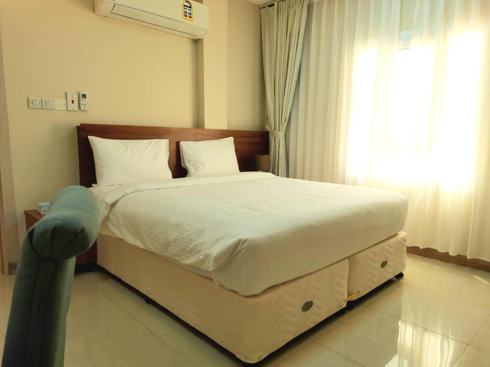 Grand Orchid Hotel Apartment Дукм Екстериор снимка